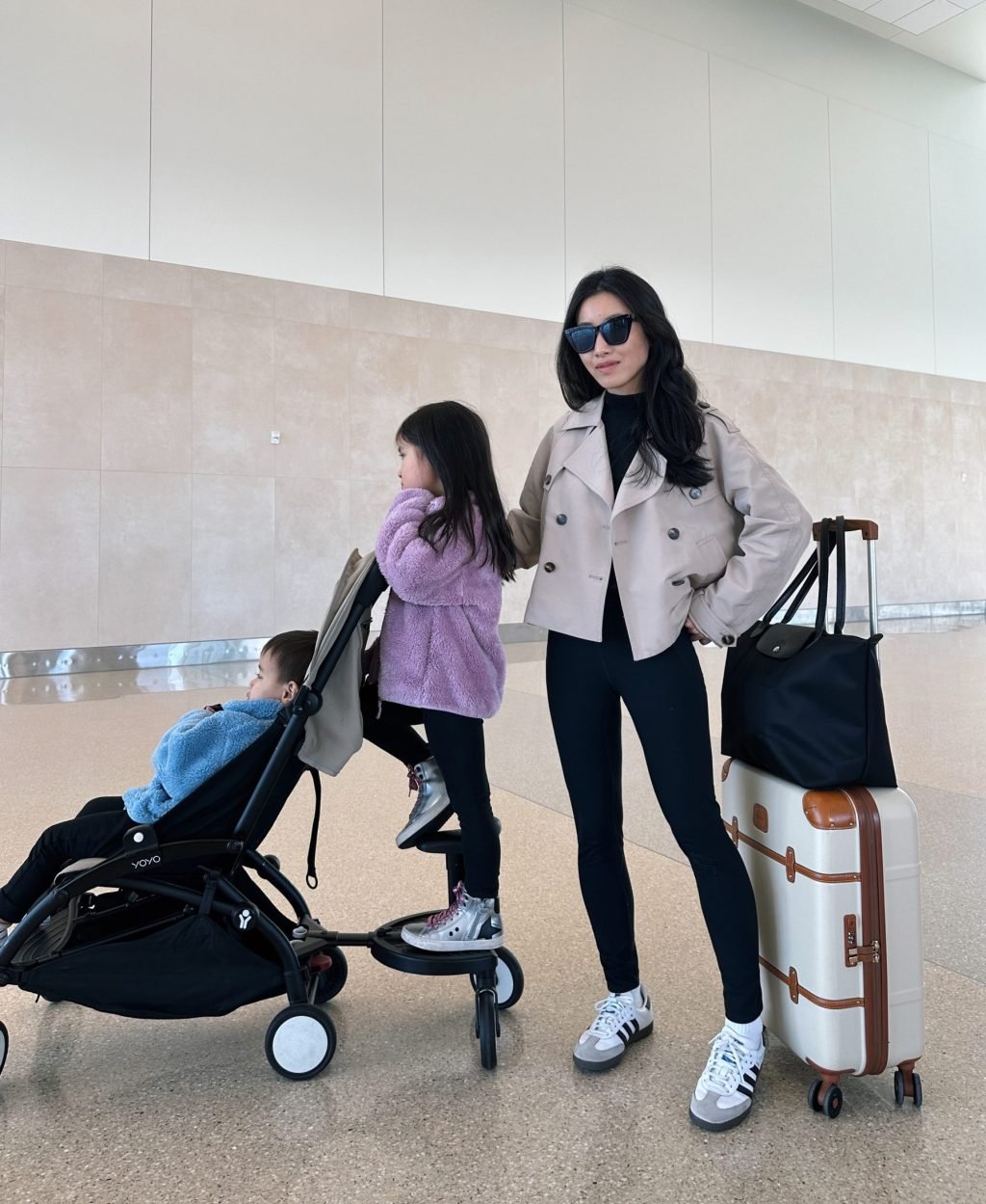 airport trench sambas outfit with kids stroller