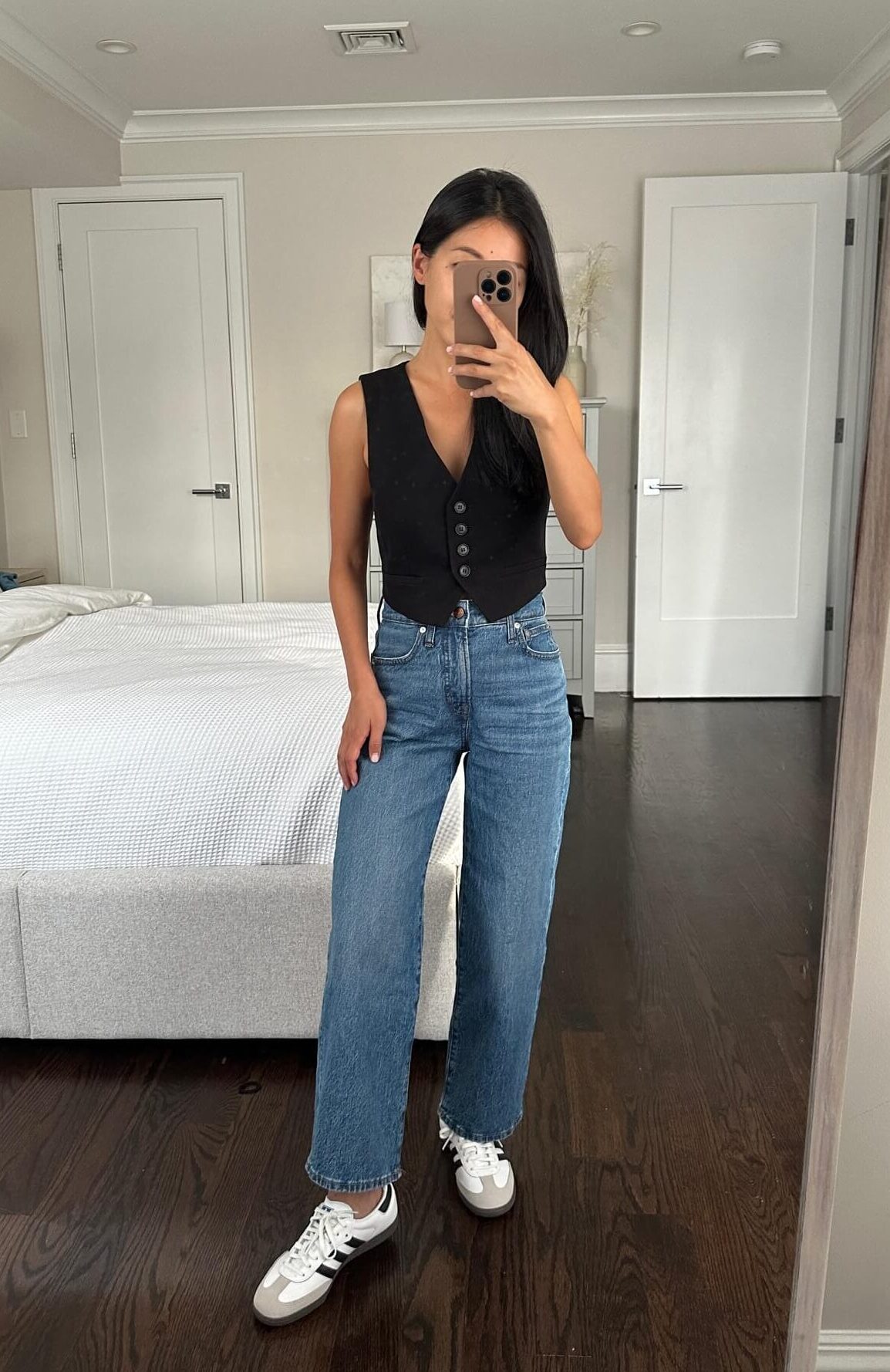 Black vest wide leg jeans sambas petite fall trends outfit 2023